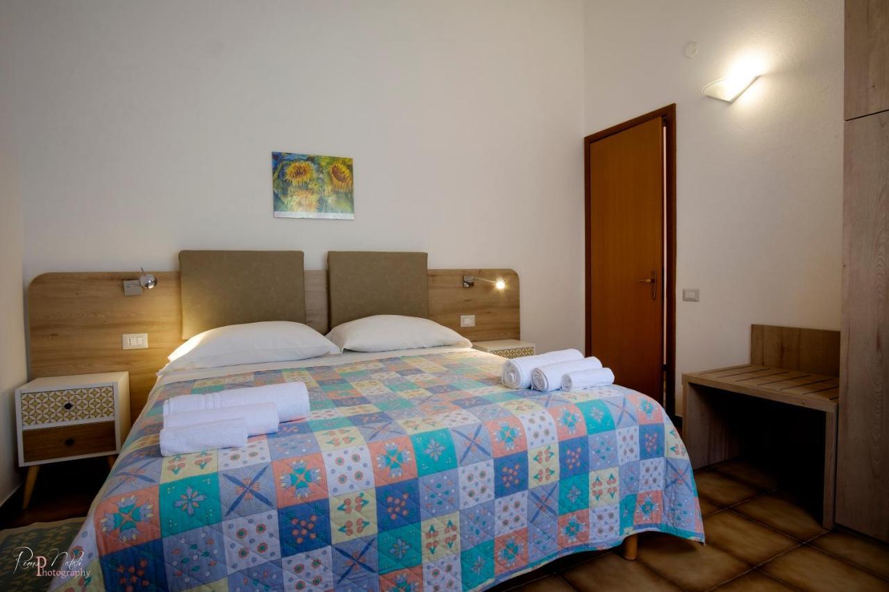 Residence Appartamenti Caffarena อาร์บาตักซ์ ภายนอก รูปภาพ