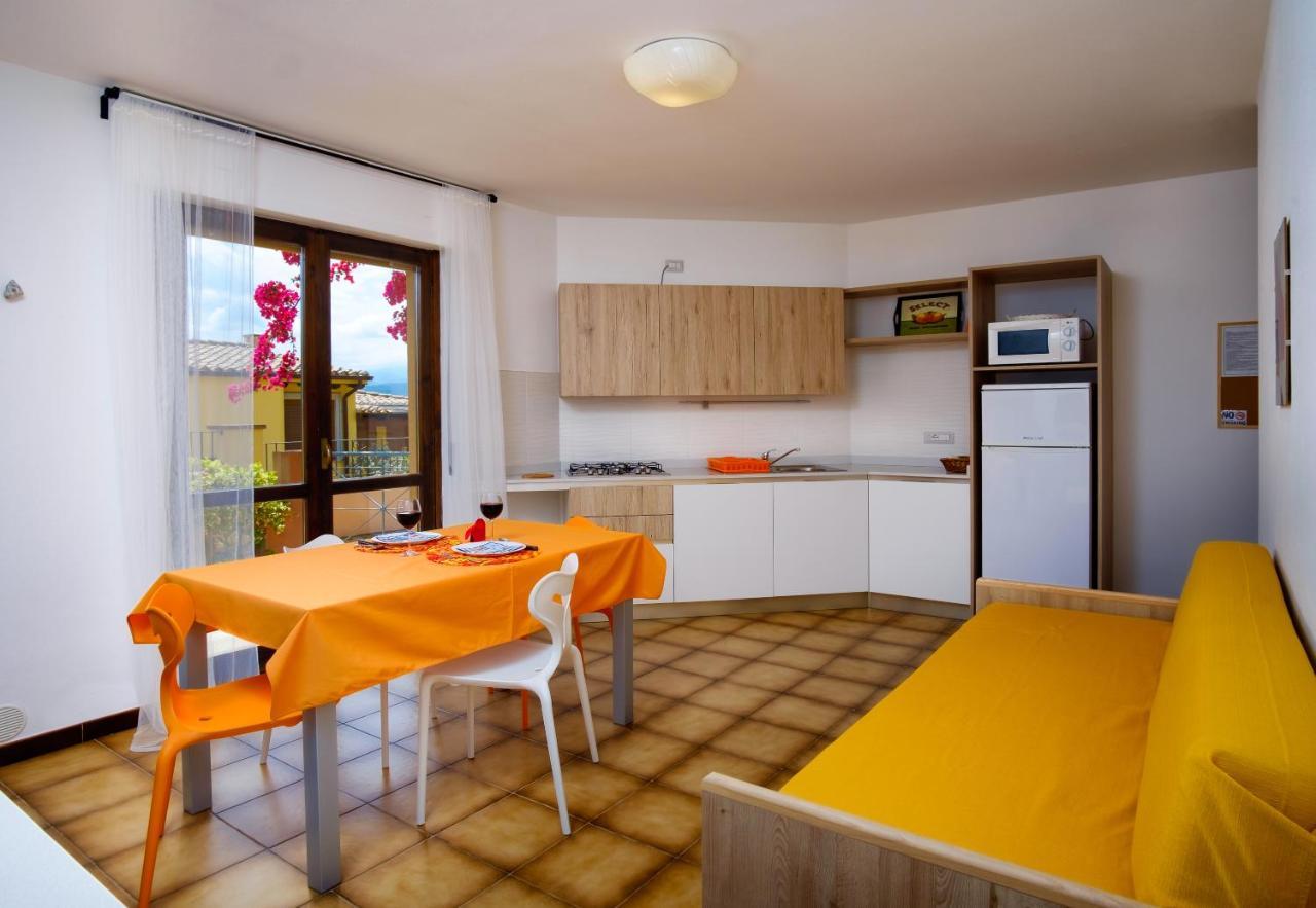 Residence Appartamenti Caffarena อาร์บาตักซ์ ภายนอก รูปภาพ